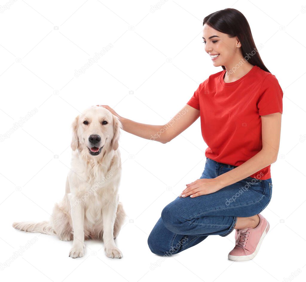 Young woman and her Golden Retriever dog on white background