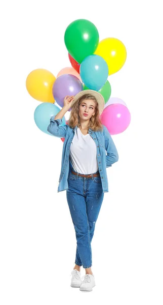 Emozionale giovane donna in possesso di mazzo di palloncini colorati su sfondo bianco — Foto Stock