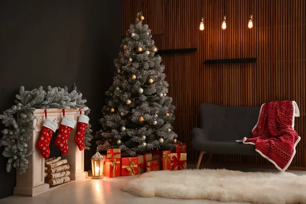 Stylish Christmas interior with decorated fir tree and fireplace — ストック写真