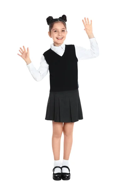 Chica feliz en uniforme escolar sobre fondo blanco —  Fotos de Stock