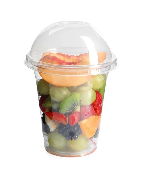 Fresh tasty fruit salad in plastic cup on white background — Stock Photo, Image