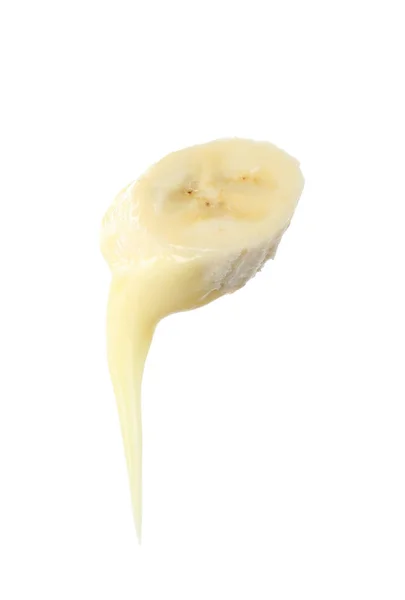 Garfo de fondue com fatia de banana mergulhada em chocolate no fundo branco — Fotografia de Stock