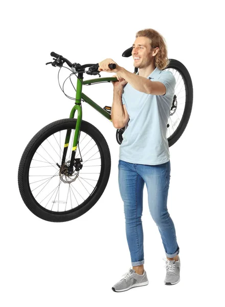 Glücklicher junger Mann mit Fahrrad auf weißem Hintergrund — Stockfoto
