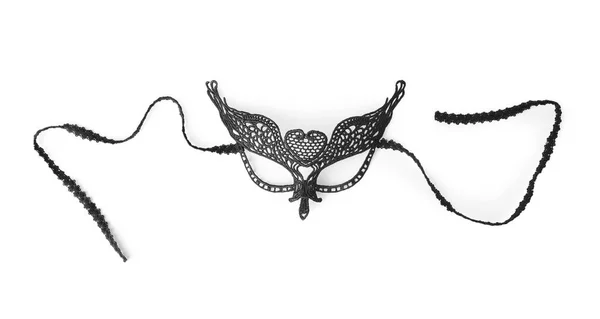 Masque en dentelle noire sur fond blanc. Accessoire pour jeu de rôle sexuel — Photo