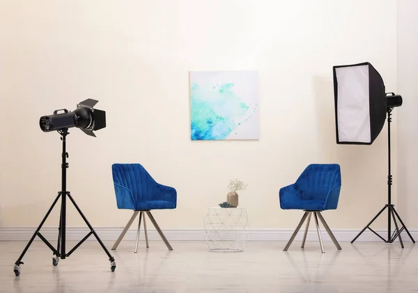 Professional photo studio equipment prepared for shooting living room interior