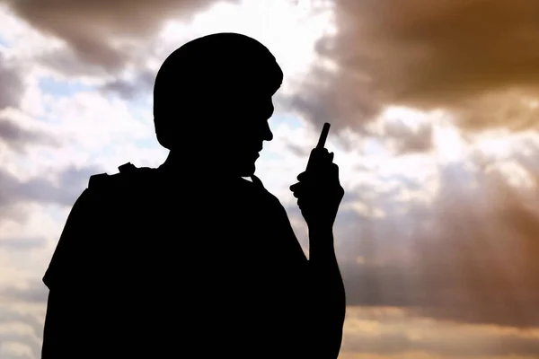 Soldier with portable radio transmitter outdoors. Military service — Stock Photo, Image