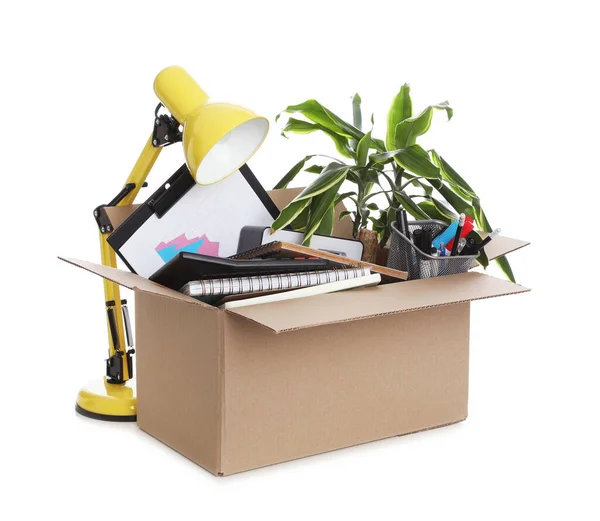 Cardboard boxes full of office stuff on white background Stock Photo by