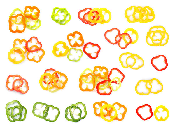 Set of cut fresh bell peppers on white background, top view 