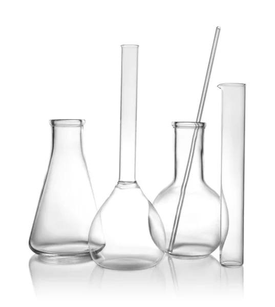 Clean empty laboratory glassware on white background — Stock Photo, Image