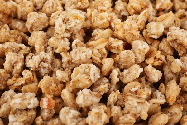 Healthy crunchy granola as background, closeup view — Stock Photo, Image