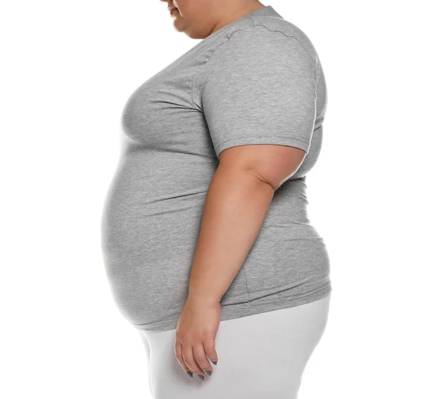 Donna in sovrappeso posa su sfondo bianco, primo piano — Foto Stock