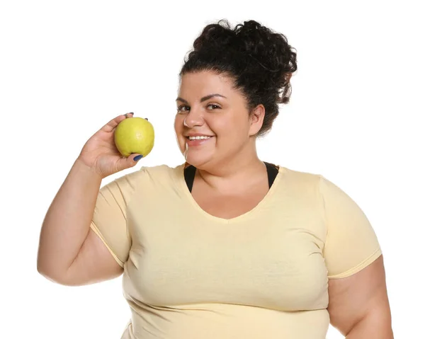 Feliz mulher com sobrepeso com maçã no fundo branco — Fotografia de Stock