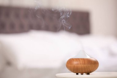 Masakapalı modern uçucu yağ difüzör. Metin için alan