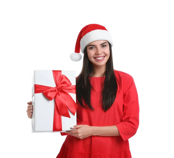 Jovem feliz em chapéu de Santa segurando presente de Natal no fundo branco — Fotografia de Stock