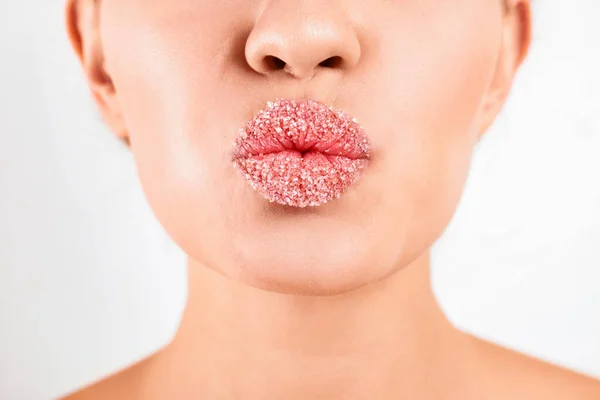 Young woman with sugar lips on white background, closeup — Stock Photo, Image