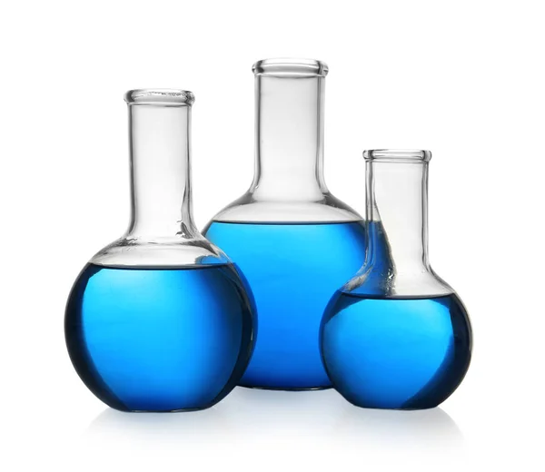 Florence flasks with blue liquid on white background. Laboratory glassware — Stock Photo, Image