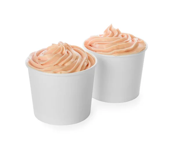 Cups with tasty frozen yogurt on white background — Stock Photo, Image