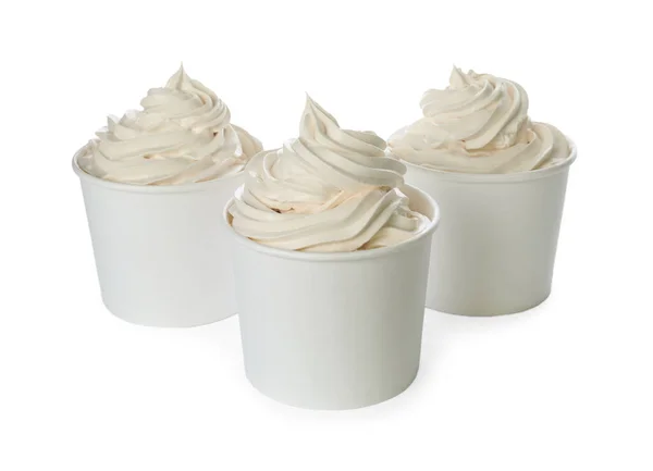 Cups with tasty frozen yogurt on white background — Stock Photo, Image