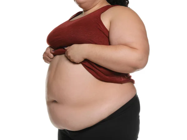 Надмірна вага жінки позує на білому тлі, крупним планом — стокове фото