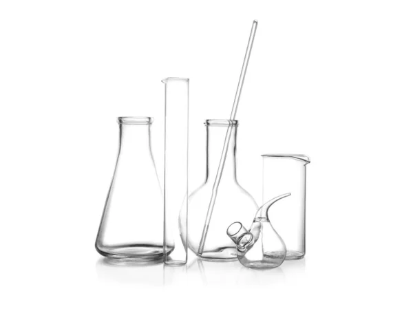 Clean empty laboratory glassware on white background — Stock Photo, Image