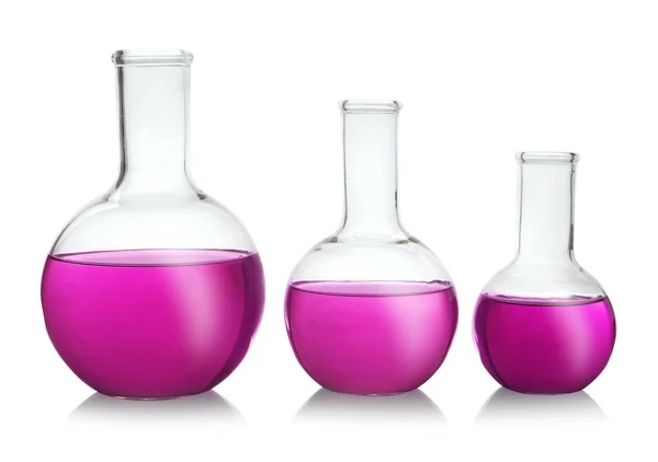 Florenca frascos com líquido roxo sobre fundo branco — Fotografia de Stock