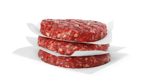 Chuletas de carne cruda para hamburguesa aisladas en blanco —  Fotos de Stock