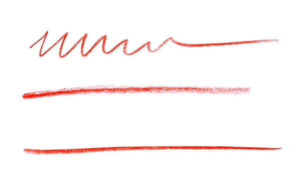 Red pencil scribbles on white background, top view — Stock Photo, Image