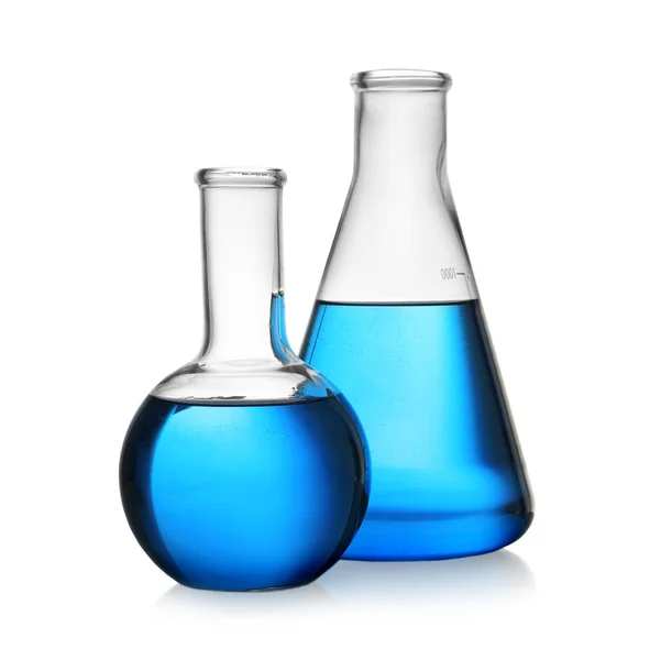 Florence and conical flasks with blue liquid on white background. Laboratory glassware — Stock Photo, Image