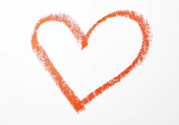 Orangefarbenes Herz auf weißem Papier, Draufsicht — Stockfoto