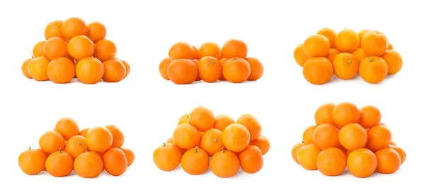 Set di mandarini freschi maturi su sfondo bianco — Foto Stock