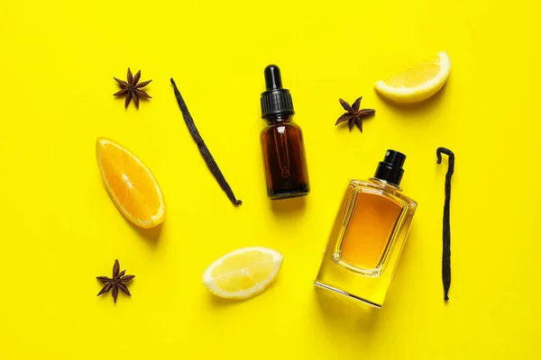 Flat lay composition with elegant perfume on yellow background — Stock Photo, Image