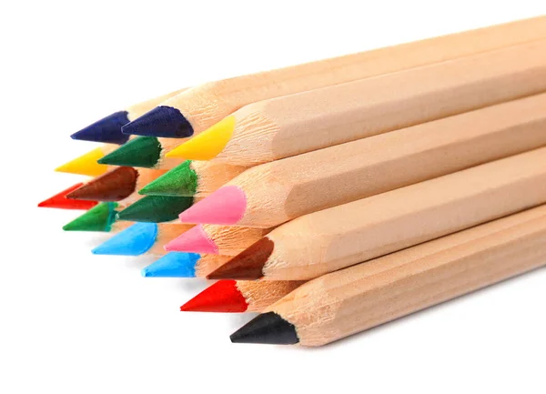 Diferentes lápis de cor no fundo branco. Papelaria escolar — Fotografia de Stock