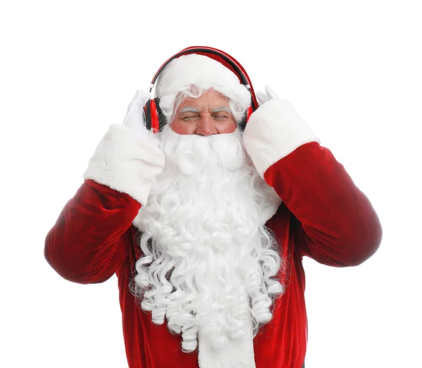 Santa Claus luisteren naar de muziek van Kerstmis op witte achtergrond — Stockfoto