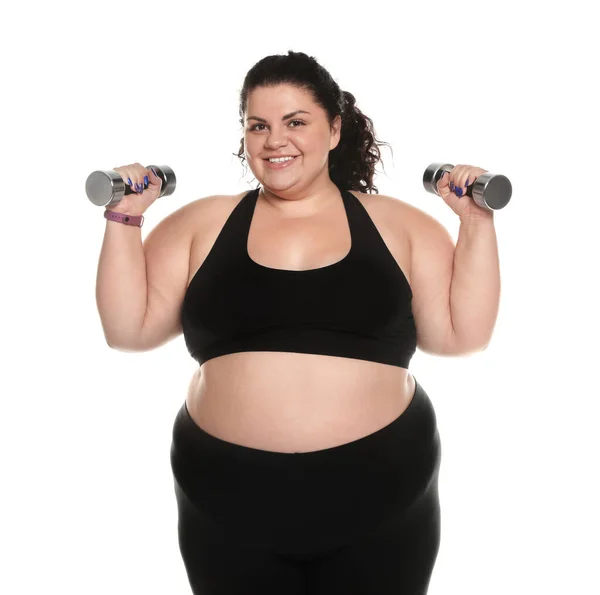 Overgewicht vrouw met dumbbells op witte achtergrond — Stockfoto