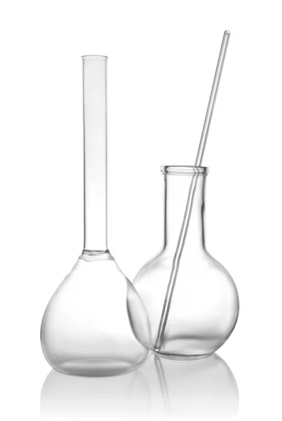 Clean empty laboratory glassware on white background — Stock Photo, Image