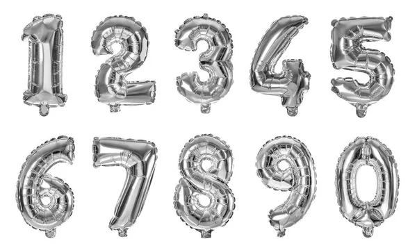 Zestaw ze srebrnymi balonami foliowymi w kształcie cyfr na białym tle — Zdjęcie stockowe