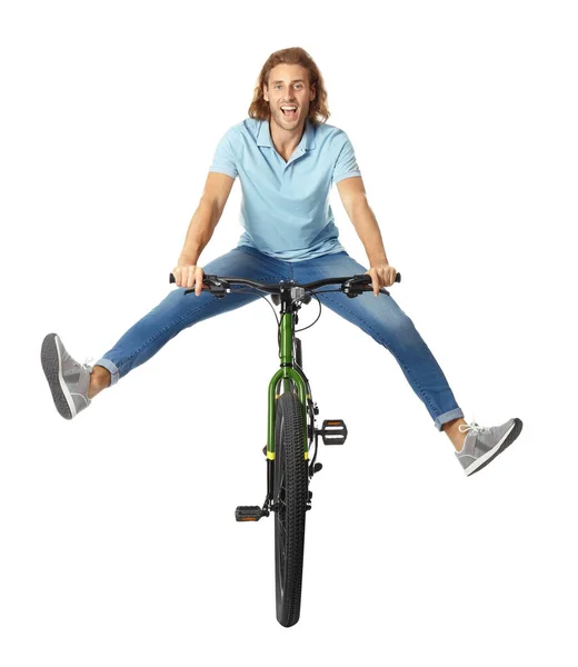 Glücklich junger Mann Fahrrad fahren auf weißem Hintergrund — Stockfoto