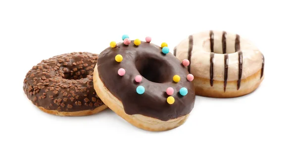 Sweet tasty glazed donuts on white background