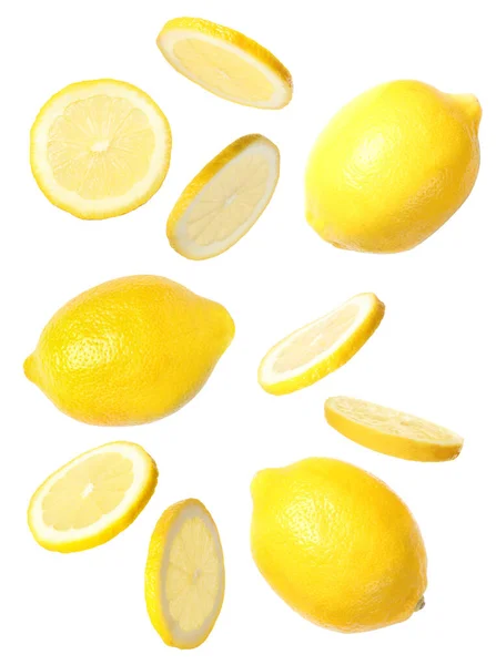 Set Deliziosi Limoni Cadenti Sfondo Bianco — Foto Stock