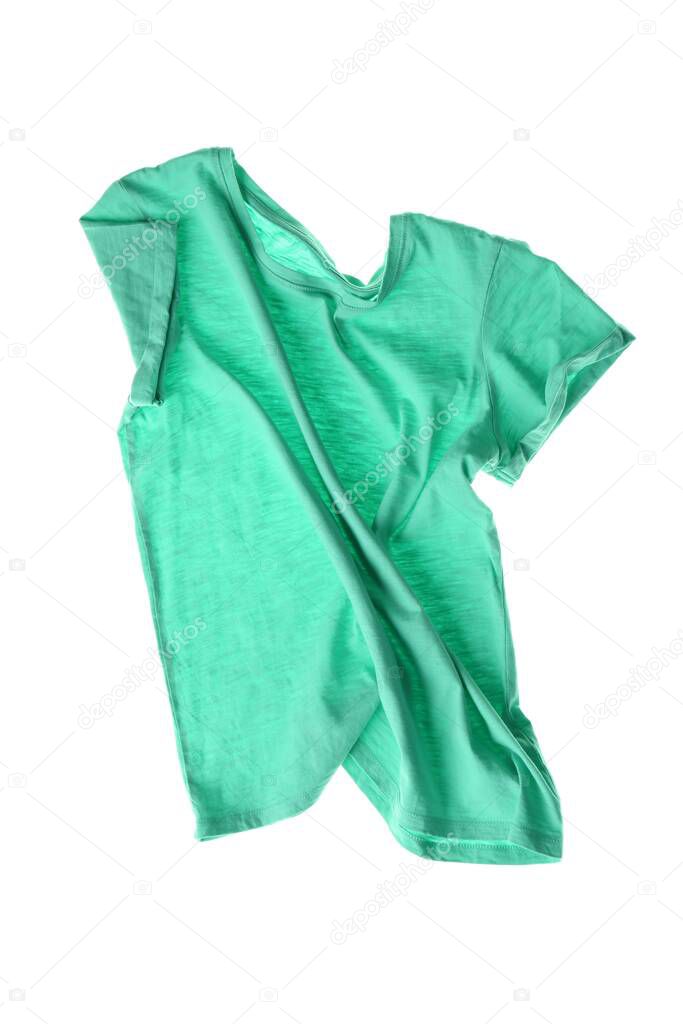 Rumpled turquoise t-shirt isolated on white. Messy clothes