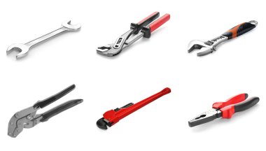 Beyaz arkaplanda tesisatçı araçları ile ayarlandı