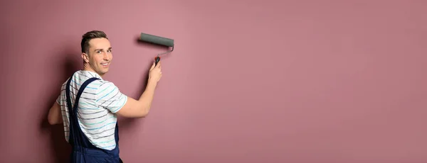 Professional Decorator Paint Roller Pink Wall Space Text Banner Design — Stock Photo, Image