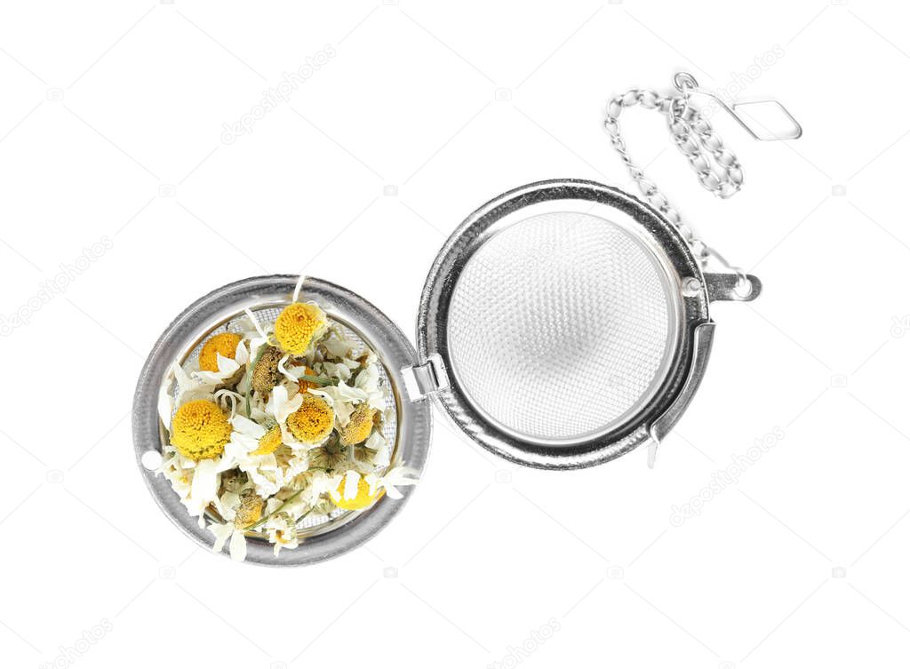 Dry chamomile flowers in infuser isolated on white, top view
