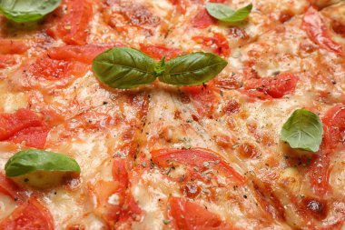 Arka plan olarak lezzetli pizza Margherita, yakın plan görünümü