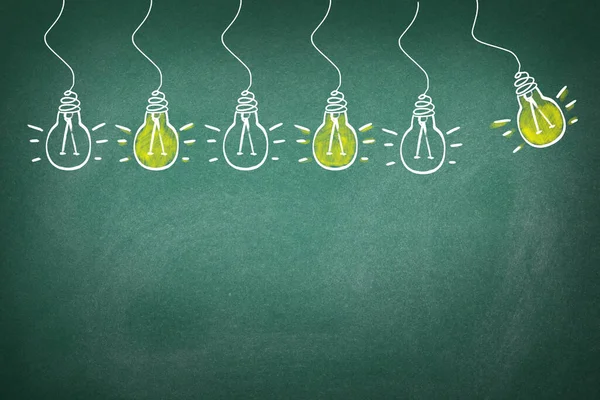 Idea Concept Light Bulbs Drawn Green Chalkboard — Stock Photo, Image