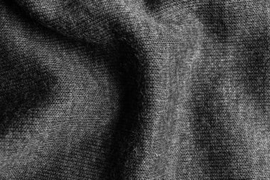 Arka plan olarak yumuşak gri kumaşın dokusu, yakın plan