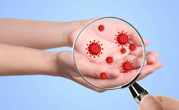 Woman Detecting Bacteria Magnifying Glass Blue Background Closeup Prevention Disease — Stock Photo, Image