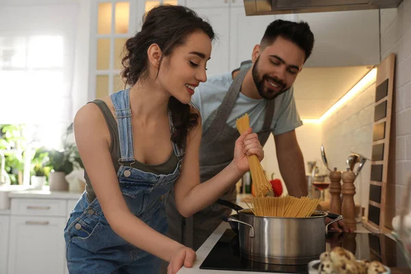 Lovely Young Couple Cooking Pasta Together Kitchen — Stock Photo, Image