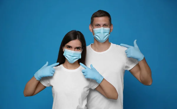 Volunteers Masks Gloves Blue Background Protective Measures Coronavirus Quarantine — Stock Photo, Image