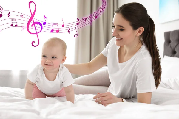 Flying Music Notes Little Baby Crawling Mother Bed Indoors Lullaby — Stock Photo, Image